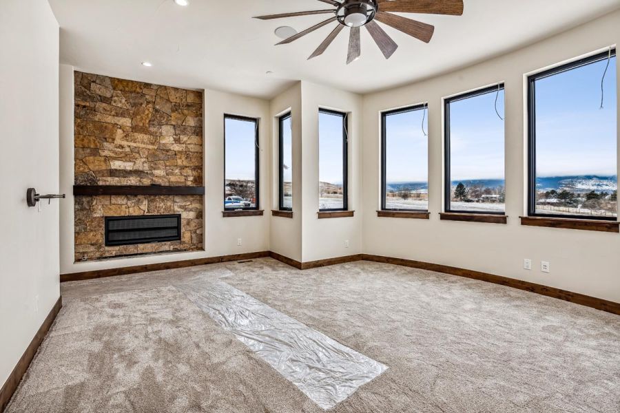 Bedroom with fireplace and views